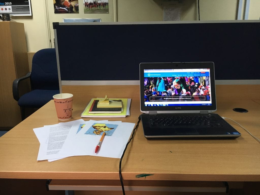 Papers and laptop on a desk in the WFP