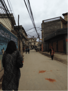 the author walking down a street