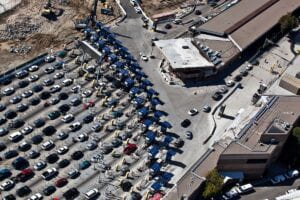 This image shows a birds-eye perspective of a fifteen-lane entry point at the San Ysidro border point. 