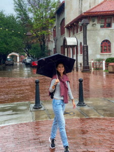 Picture of Jimena Suarez holding an umbrella